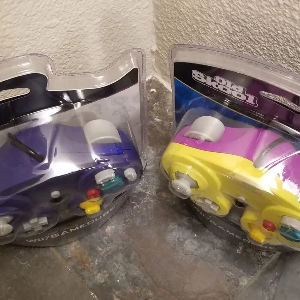 2 Gamecube Controllers - Purple & Yellow (NEW) - Nintendo